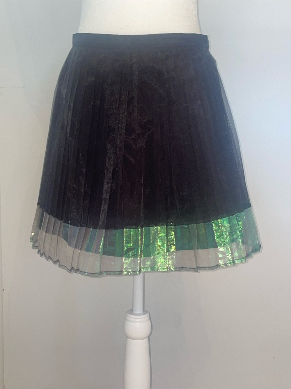 Black Pleated Skirt with Iridescent Green Hem